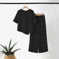 Ensemble deux pièces pour femme : haut à ourlet asymétrique et pantalon à jambes larges