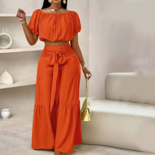 Ensemble deux pièces haut épaules nues à manches bouffantes et pantalon large – Élégant, confortable et parfait pour les journées d’été ☀️