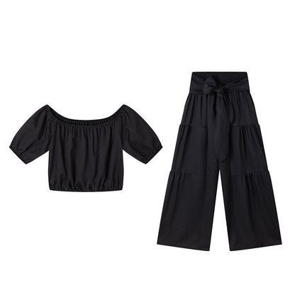 Ensemble deux pièces haut épaules nues à manches bouffantes et pantalon large – Élégant, confortable et parfait pour les journées d’été ☀️