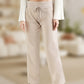 Pantalon de jogging taille haute et coupe ajustée, cordon de serrage et poches