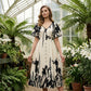 Robe midi élégante à col en V et imprimé botanique