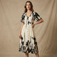 Robe midi élégante à col en V et imprimé botanique