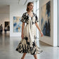 Robe midi élégante à col en V et imprimé botanique